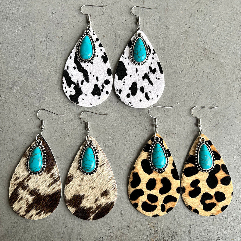 Cowhide print turquoise teardrop earrings by Turquoise Vintage